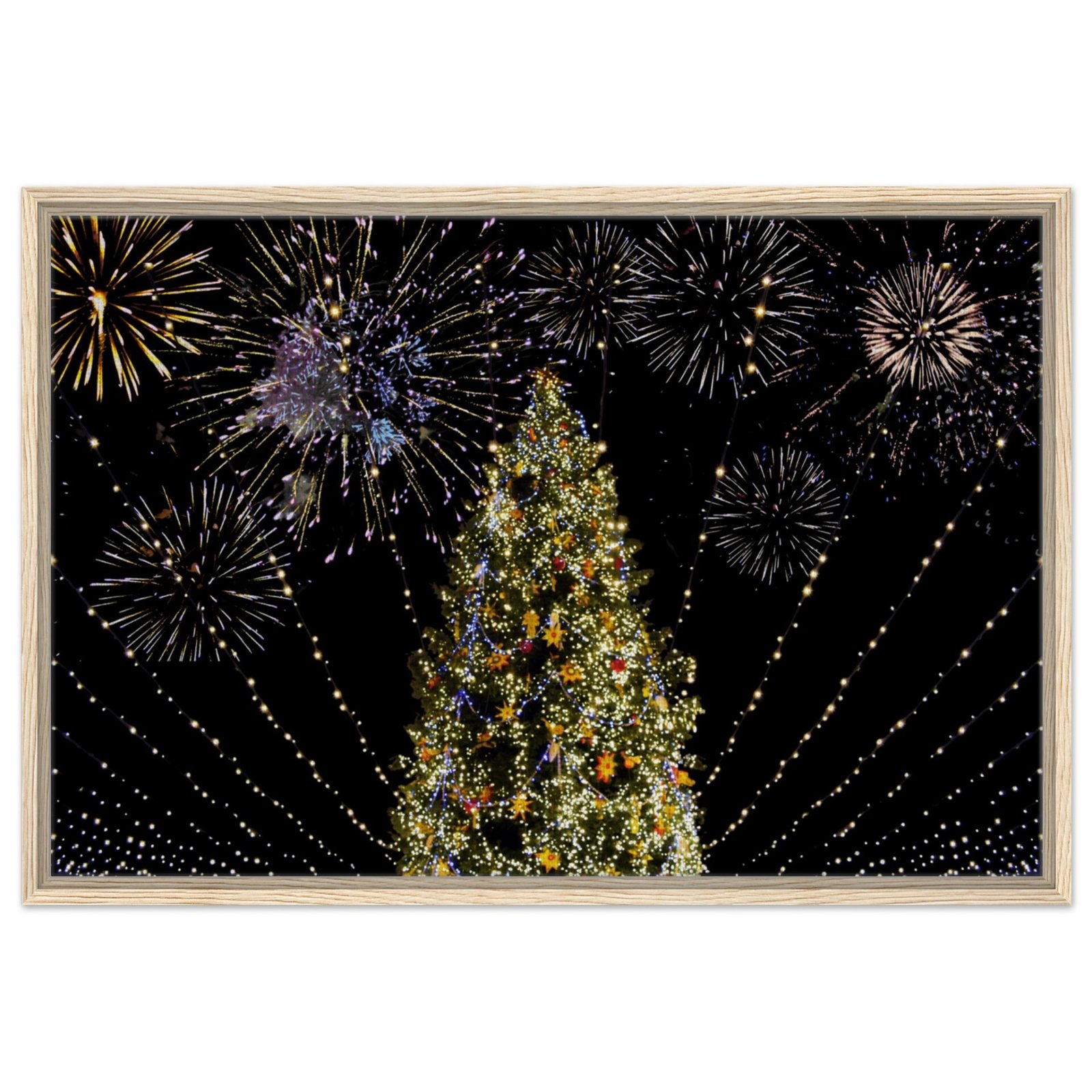 This dazzling photo wall art prints on canvas showcases the ultimate holiday celebration, with a beautifully lit Christmas tree standing tall beneath a canopy of twinkling lights and vibrant fireworks.- Artisiem